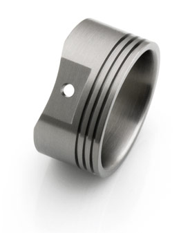 Titanium ring with round reliefs at the bottom for a Piston Skirt look. 
