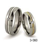 titanium rings with precious metal inlays