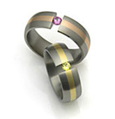 gemstone tension titanium ring with gold inlay