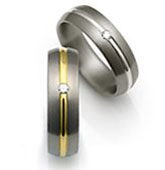titanium rings with diamonds and round gold inlays