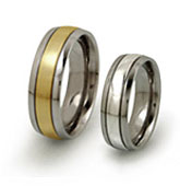 titanium rings with precious metal center and thin grooves