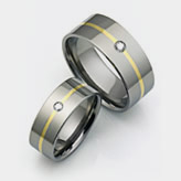 Titanium wedding bands with gold and diamond inlays