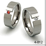 Tension set titanium ring with round stones