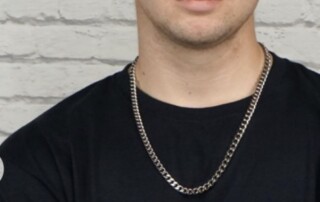 A man wearing a titanium chain