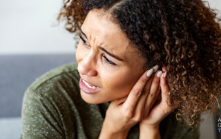 Woman with painful earrings