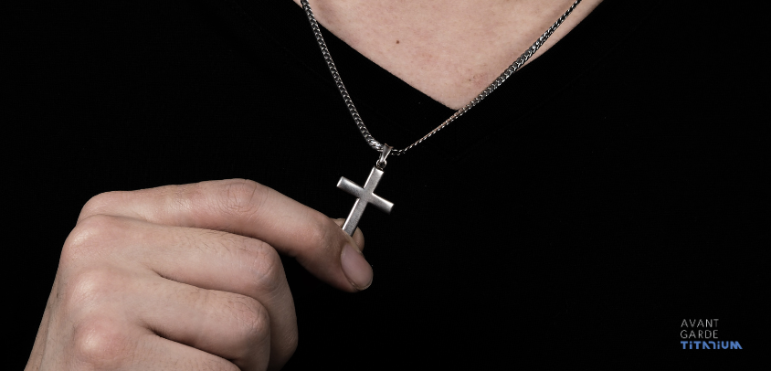 man wearing a titanium cross hypoallergenic jewelry