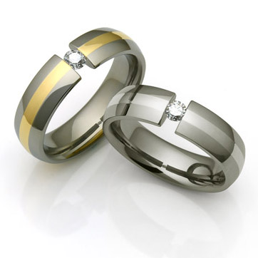 Men's Titanium wedding rings made with diamonds and gold inlays