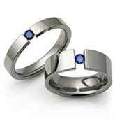 tension titanium rings with round gemstones