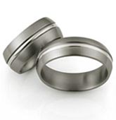 domed titanium rings with round wire inlay